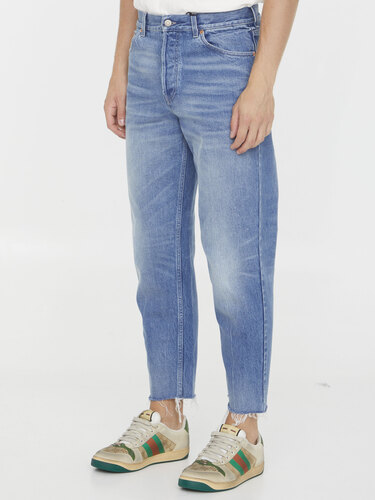 구찌 Washed-out denim jeans 749110